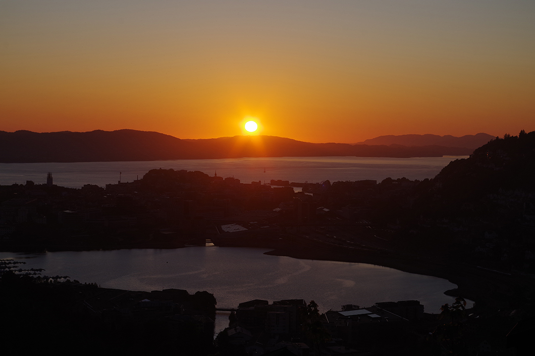 A magical sunset over the fjords near Bergen, the perfect end to a day of exploration.