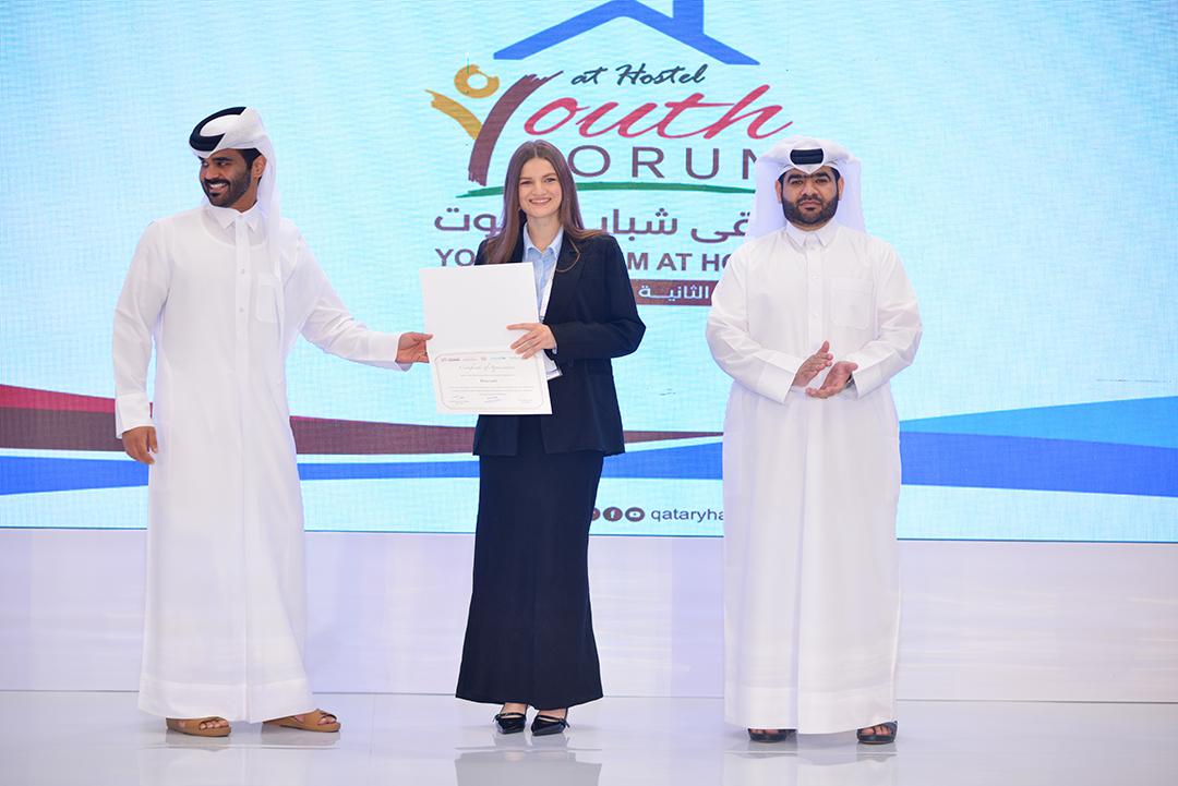 Youth forum representatives together with local hosts in Qatar, reflecting international partnership, cultural exchange and youth engagement.