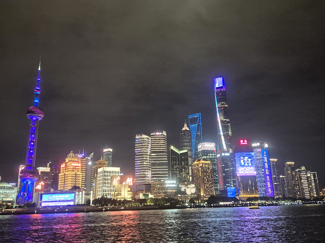 Night view of Shanghai’s futuristic skyline, representing rapid economic growth, technological progress and the modern face of China.