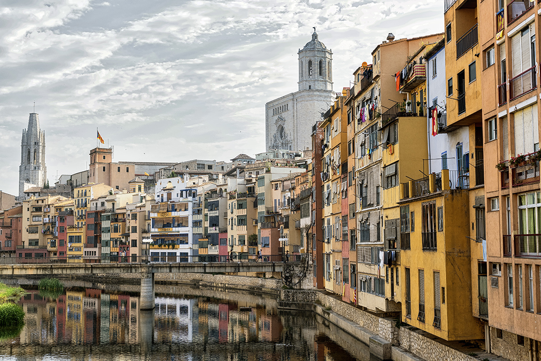 Colorful houses along the Onyar River in Girona create one of the most recognizable views of the Catalan city.