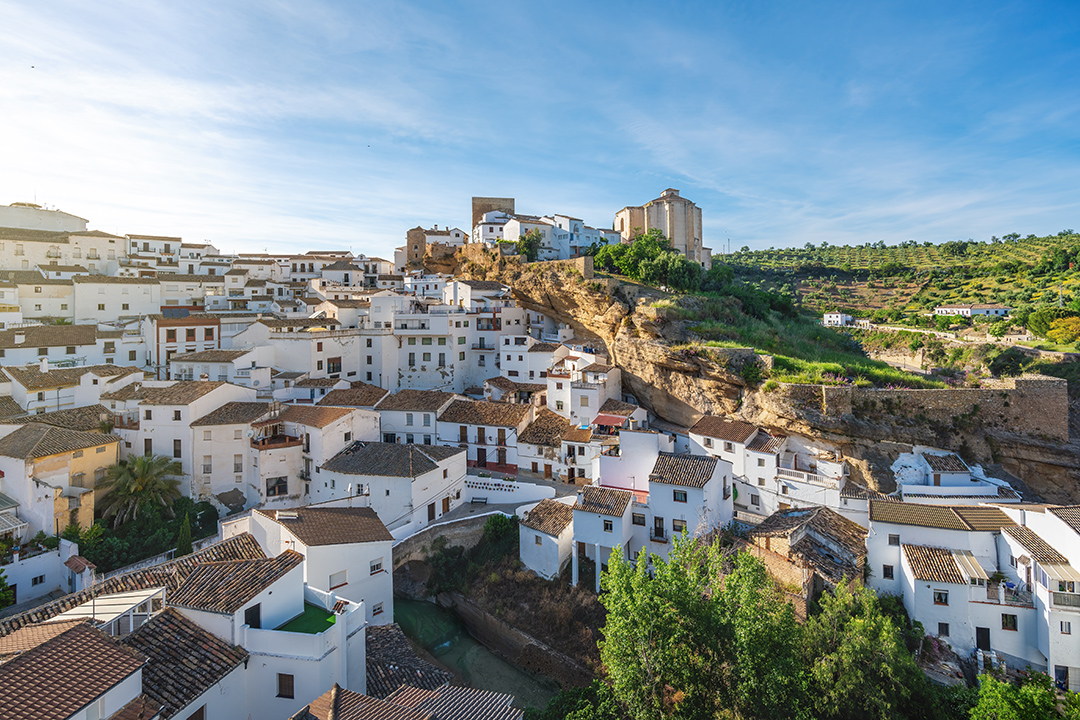 A white village in Andalusia reflects the traditional architecture of southern Spain.